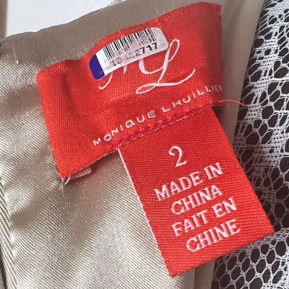 Monique Lhuillier gown with an all-over lace floral appliqué styling Gown - Picture 4 of 4